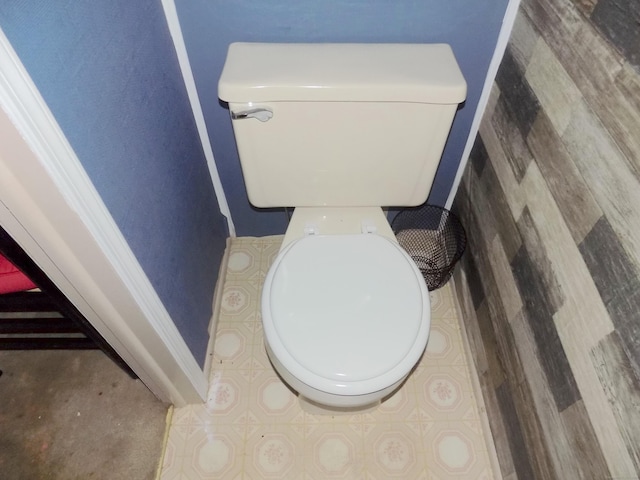 61 Elm St, East Windsor, CT 06088 - bathroom with toilet and baseboards