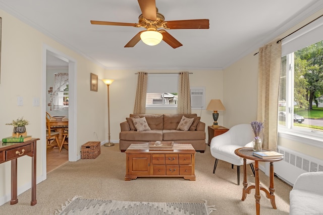 76 Landers Rd, East Hartford, CT 06118 - living area featuring radiator heating unit, light carpet, crown molding, and a ceiling fan