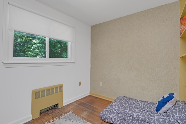 76 Landers Rd, East Hartford, CT 06118 - bedroom featuring radiator and hardwood / wood-style flooring