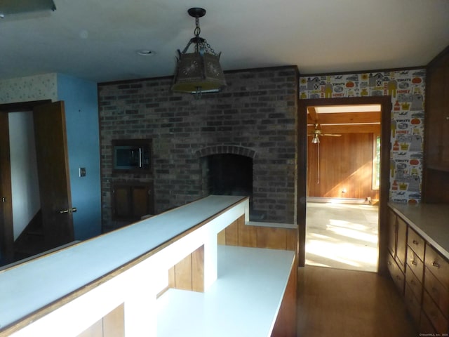 5 Tower Hill Lake Rd, Deep River, CT 06417 - kitchen featuring hanging light fixtures and a fireplace