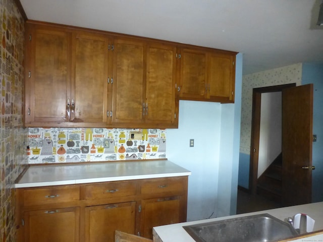 5 Tower Hill Lake Rd, Deep River, CT 06417 - kitchen with brown cabinets, light countertops, and tasteful backsplash