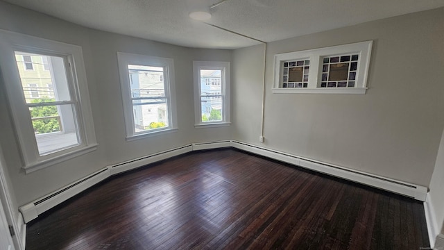 62 Miller St, New Britain, CT 06053 - unfurnished room with dark wood-style flooring and a textured ceiling