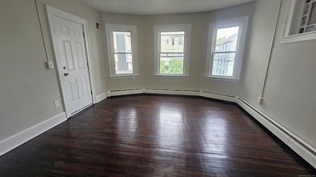 62 Miller St, New Britain, CT 06053 - unfurnished room featuring plenty of natural light and dark wood finished floors