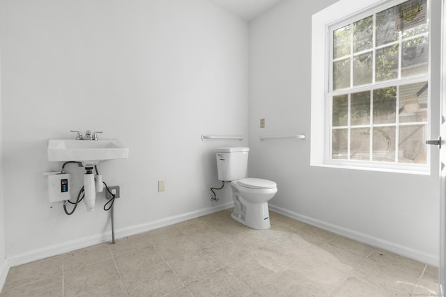 33 William St, Danbury, CT 06810 - bathroom with toilet and tile patterned flooring