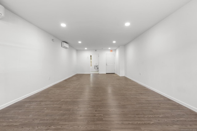 33 William St, Danbury, CT 06810 - unfurnished room with recessed lighting, dark wood-style flooring, and a wall unit AC