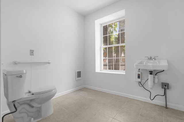 33 William St, Danbury, CT 06810 - bathroom featuring toilet and heating unit