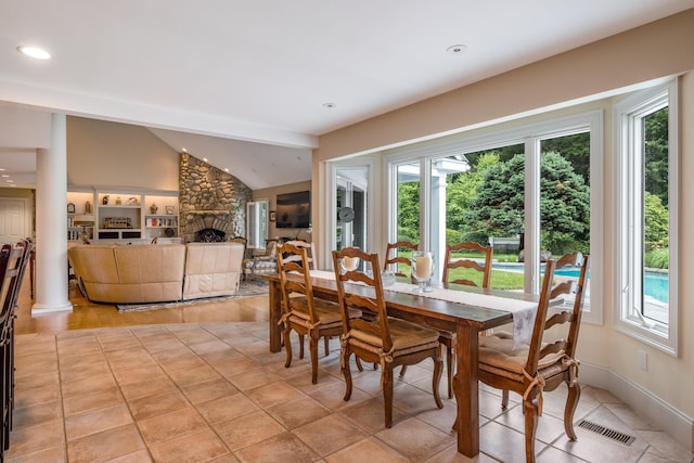 8 Up The Rd, Simsbury, CT 06092 - dining room with lofted ceiling, a fireplace, and recessed lighting