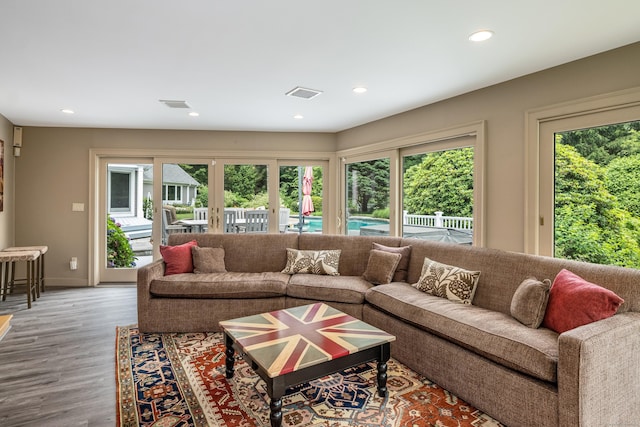 8 Up The Rd, Simsbury, CT 06092 - living area with plenty of natural light, wood finished floors, and recessed lighting