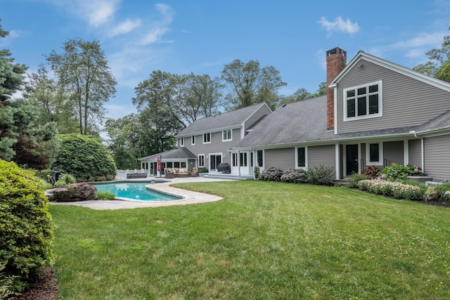 8 Up The Rd, Simsbury, CT 06092 - back of house with a lawn, a patio, an outdoor pool, a chimney, and a gazebo