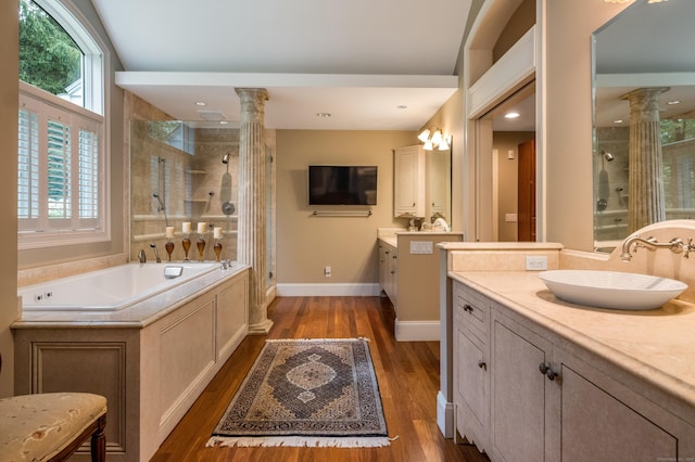 8 Up The Rd, Simsbury, CT 06092 - full bathroom with ornate columns, a stall shower, two vanities, and healthy amount of natural light