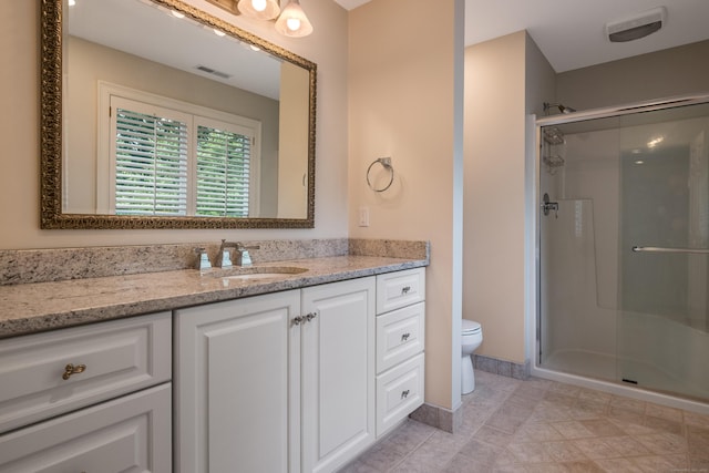 8 Up The Rd, Simsbury, CT 06092 - bathroom featuring a stall shower, vanity, and tile patterned flooring