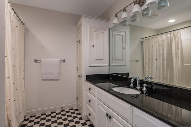 8 Up The Rd, Simsbury, CT 06092 - full bathroom featuring tile patterned floors, vanity, and curtained shower
