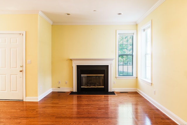 14 Last Leaf Cir Unit 14, Windsor, CT 06095 - unfurnished living room with wood finished floors, a fireplace with flush hearth, and crown molding