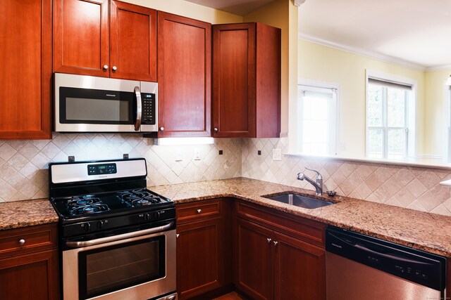 14 Last Leaf Cir Unit 14, Windsor, CT 06095 - kitchen featuring stainless steel appliances, light stone counters, backsplash, and crown molding