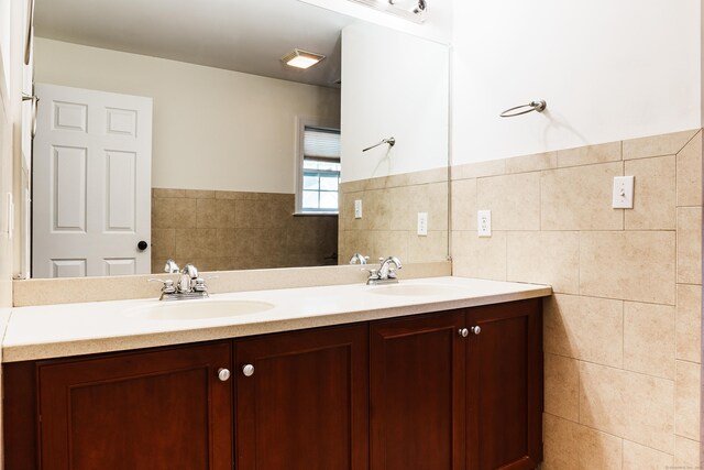 14 Last Leaf Cir Unit 14, Windsor, CT 06095 - full bath featuring double vanity, tile walls, and wainscoting