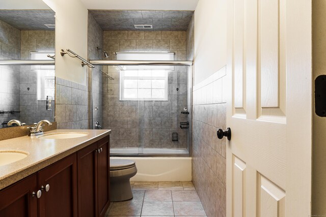 14 Last Leaf Cir Unit 14, Windsor, CT 06095 - full bathroom featuring enclosed tub / shower combo, tile walls, and double vanity