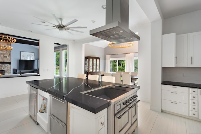 106A Comstock Hill Ave, Norwalk, CT 06850 - kitchen with island exhaust hood, double oven range, dark countertops, open floor plan, and wine cooler