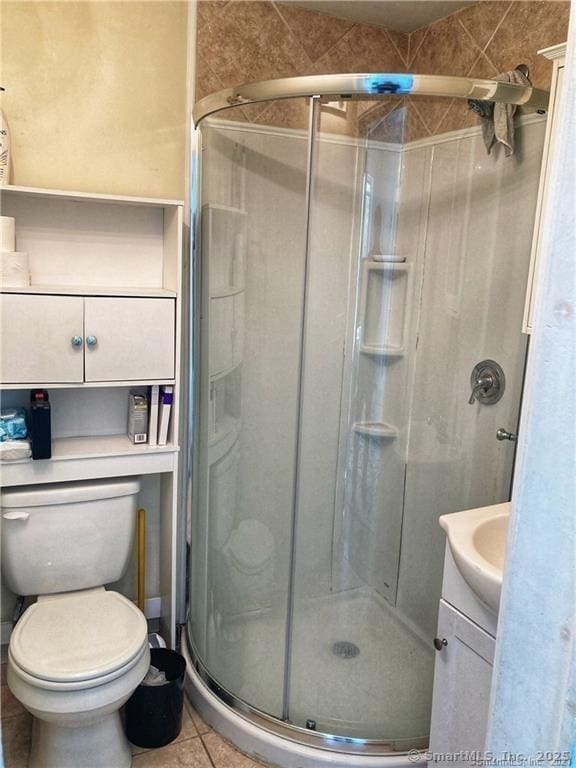 288 Benham Rd, Groton, CT 06340 - bathroom with vanity, a shower stall, and tile patterned flooring
