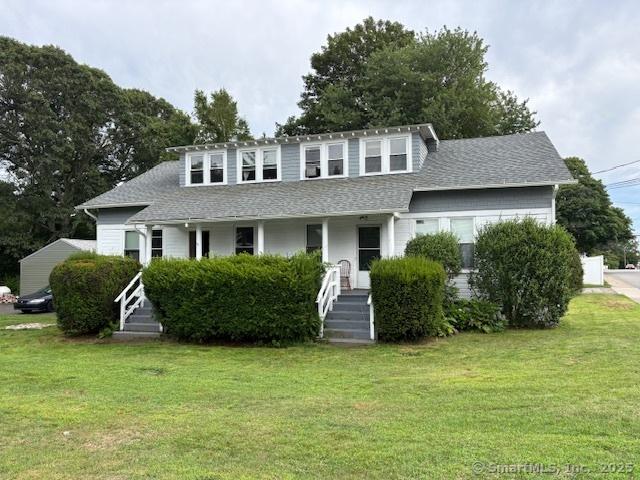 288 Benham Rd, Groton, CT 06340 - view of front of property with a front yard, a shingled roof, and covered porch