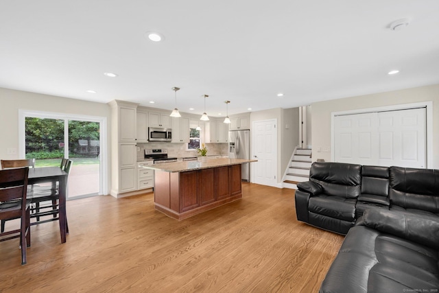 18 Arbor Rd, Monroe, CT 06468 - living room with light wood-style floors, recessed lighting, and stairway