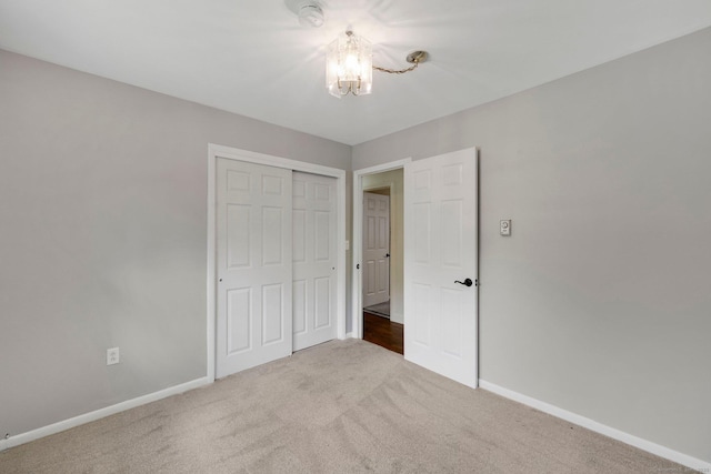 18 Arbor Rd, Monroe, CT 06468 - unfurnished bedroom featuring a chandelier, carpet floors, and a closet