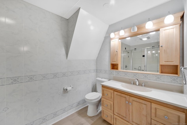 18 Arbor Rd, Monroe, CT 06468 - bathroom with a stall shower, vanity, tile walls, and wood finished floors