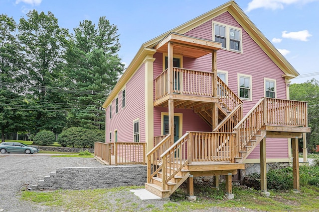 326 Rte 169, Woodstock, CT 06281 - rear view of property with stairway and a wooden deck