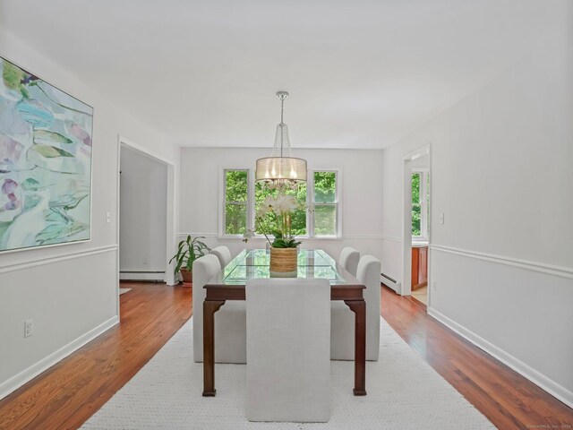20 Mountain Wood Rd, Stamford, CT 06903 - dining area with a chandelier, wood finished floors, and baseboard heating
