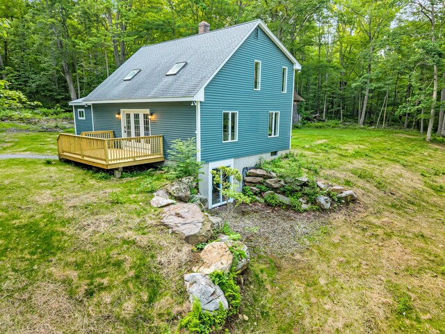 53 Windham Rd, Hampton, CT 06247 - back of house featuring a wooden deck, a chimney, a shingled roof, and a wooded view