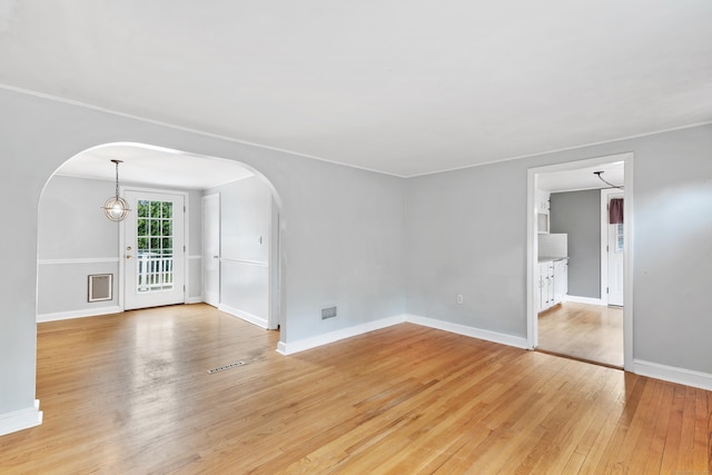 3 Lynette Dr, North Haven, CT 06473 - spare room featuring arched walkways and light wood-type flooring