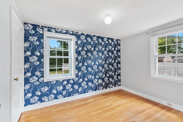 3 Lynette Dr, North Haven, CT 06473 - spare room with wood finished floors, ornamental molding, and wallpapered walls