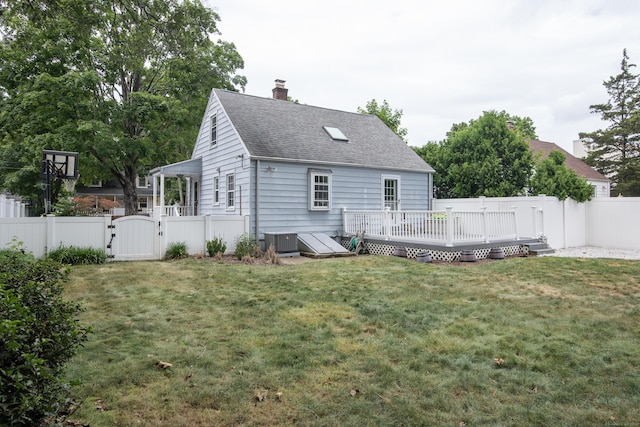 3 Lynette Dr, North Haven, CT 06473 - rear view of property with a gate, a deck, roof with shingles, a fenced backyard, and a chimney
