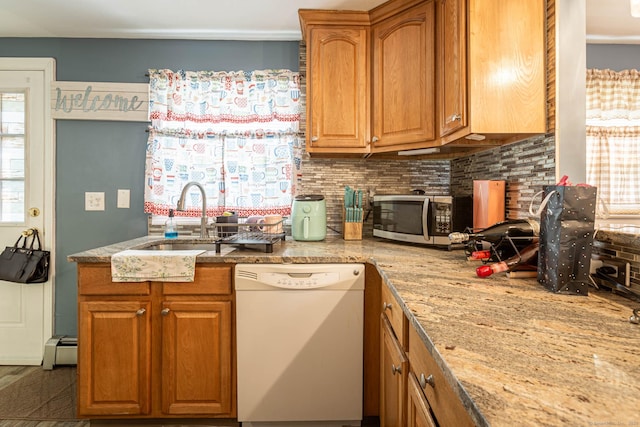 19 Marion St, Hartford, CT 06106 - kitchen with white dishwasher, stainless steel microwave, tasteful backsplash, a baseboard heating unit, and healthy amount of natural light