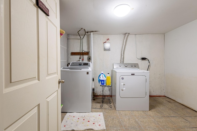 19 Marion St, Hartford, CT 06106 - laundry area featuring washing machine and dryer and light tile patterned floors