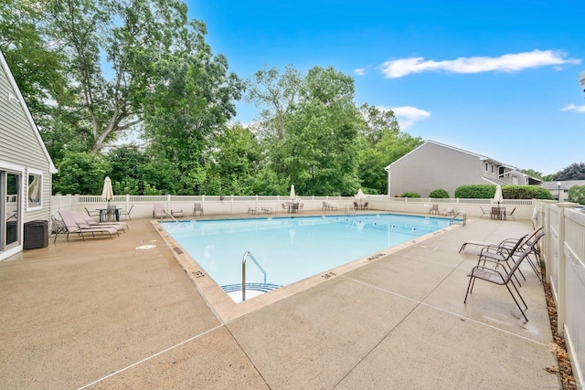 182 Shagbark Dr Unit 182, Derby, CT 06418 - community pool featuring a patio area and view of wooded area