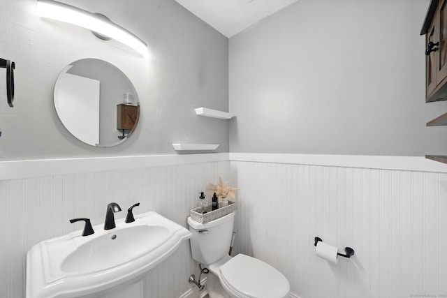 182 Shagbark Dr Unit 182, Derby, CT 06418 - half bathroom featuring a wainscoted wall and a sink