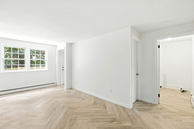 5 Church St Apt R, East Windsor, CT 06016 - unfurnished room featuring a baseboard heating unit and baseboards