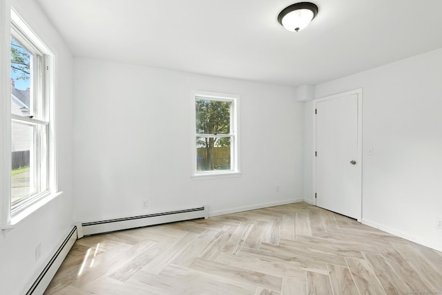5 Church St Apt R, East Windsor, CT 06016 - spare room with a baseboard heating unit and healthy amount of natural light
