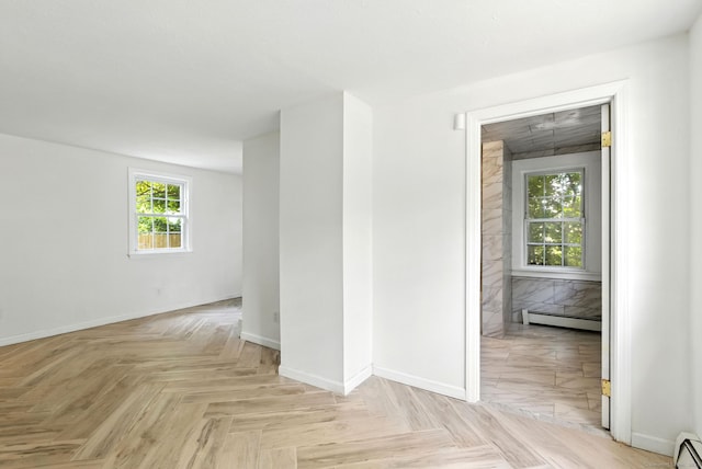 5 Church St Apt R, East Windsor, CT 06016 - empty room featuring a baseboard radiator