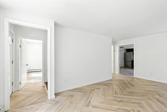5 Church St Apt R, East Windsor, CT 06016 - unfurnished room with a baseboard radiator and baseboards
