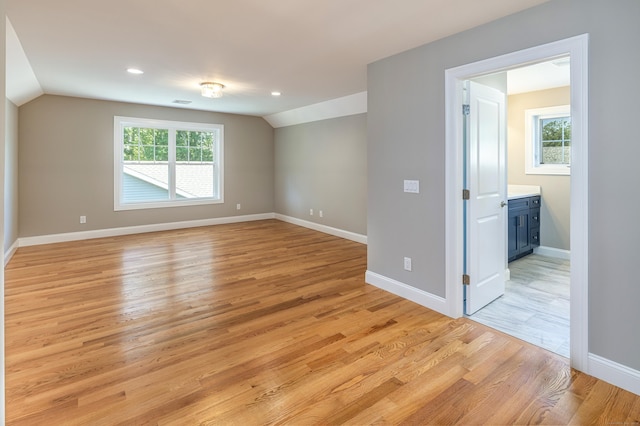 6 Kaatskill Ln, East Lyme, CT 06357 - unfurnished room with vaulted ceiling, light wood-style floors, and recessed lighting