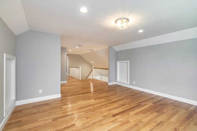 6 Kaatskill Ln, East Lyme, CT 06357 - additional living space with lofted ceiling, light wood finished floors, and recessed lighting
