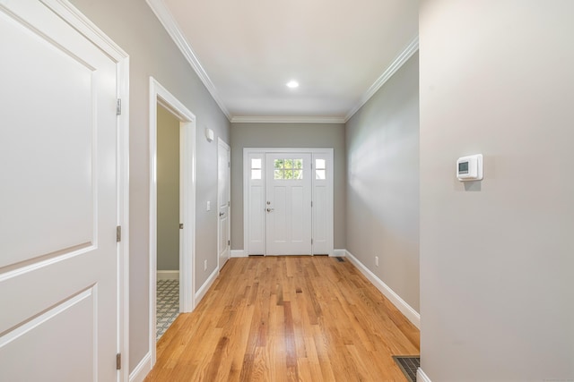 6 Kaatskill Ln, East Lyme, CT 06357 - entryway with light wood-type flooring, crown molding, and recessed lighting