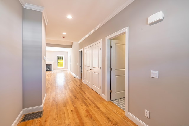 6 Kaatskill Ln, East Lyme, CT 06357 - hall with ornamental molding, light wood-style flooring, and recessed lighting
