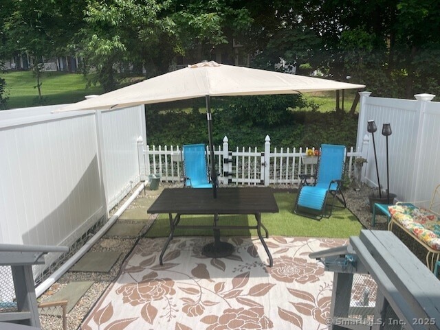 104 N Turnpike Rd Unit B, Wallingford, CT 06492 - fenced backyard with a patio