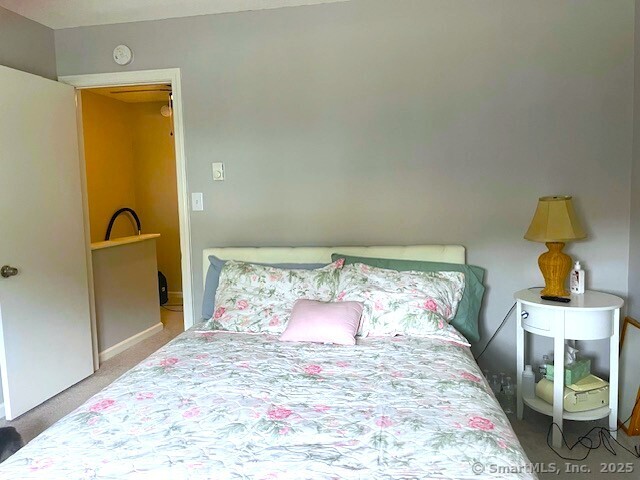 104 N Turnpike Rd Unit B, Wallingford, CT 06492 - carpeted bedroom with baseboards