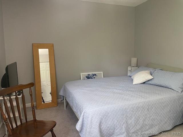 104 N Turnpike Rd Unit B, Wallingford, CT 06492 - bedroom featuring carpet floors and baseboards