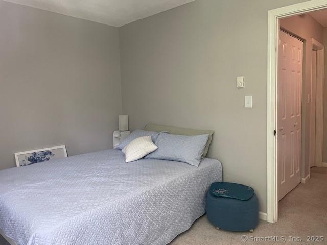 104 N Turnpike Rd Unit B, Wallingford, CT 06492 - carpeted bedroom featuring baseboards