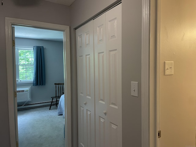 104 N Turnpike Rd Unit B, Wallingford, CT 06492 - corridor with baseboard heating, carpet flooring, and a wall mounted AC