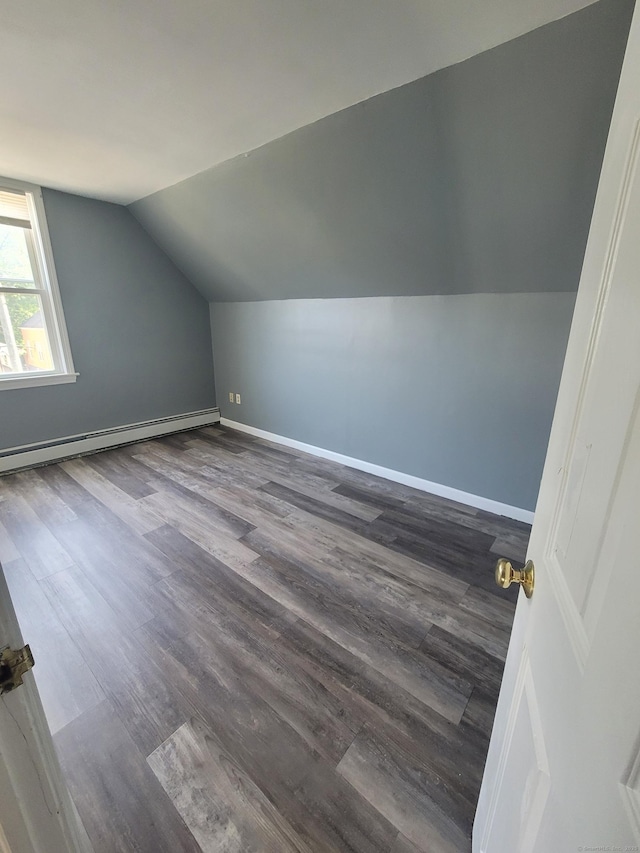 45 Mahl Ave, Hartford, CT 06154 - bonus room with a baseboard radiator, vaulted ceiling, and dark wood-style flooring